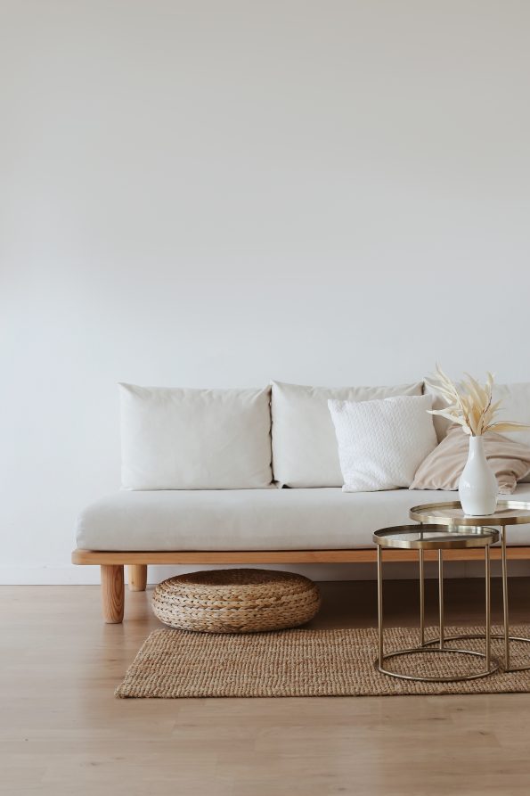 White couch on wooden floor