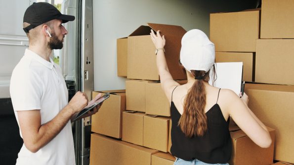 Man and woman checking the packages